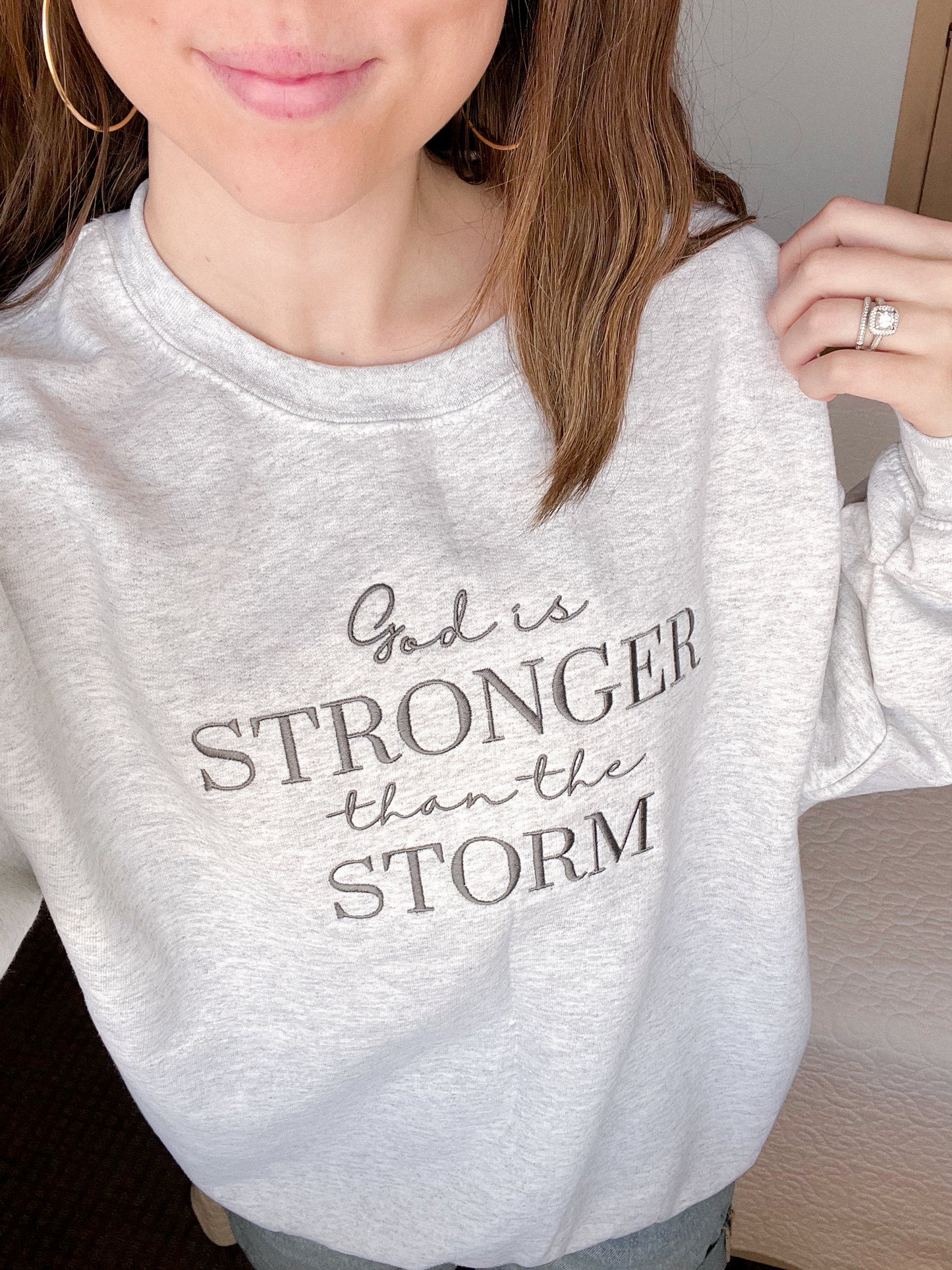 God Is Stronger Than The Storm Sweatshirt